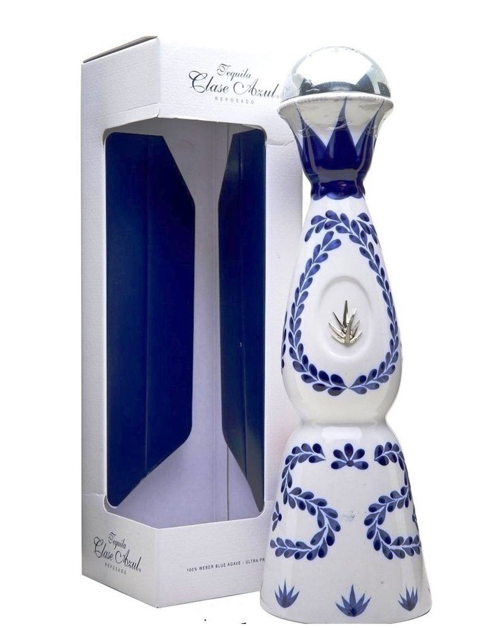 Decorative bottle with blue and white design, featuring a box in the background.