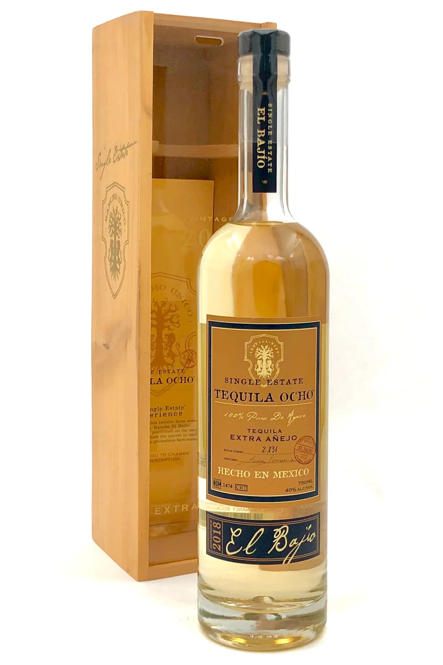 Tequila Ocho bottle with wooden box on a white background